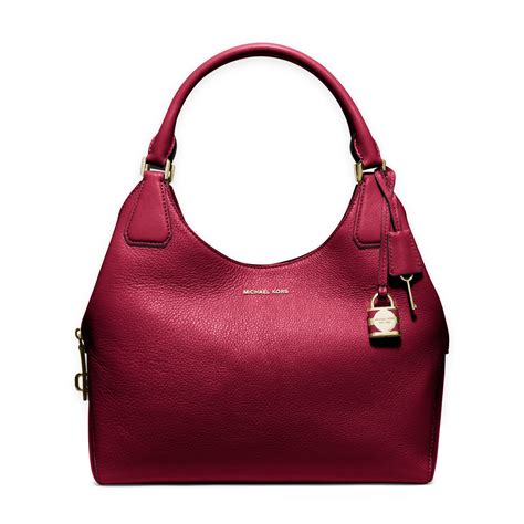 michael kors cherry red wallet|Michael Kors red shoulder bag.